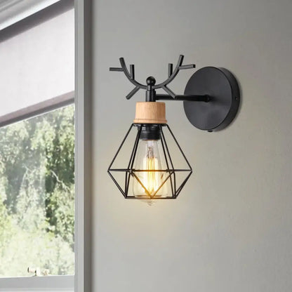 Geometric black iron cage wall light for bedroom decor