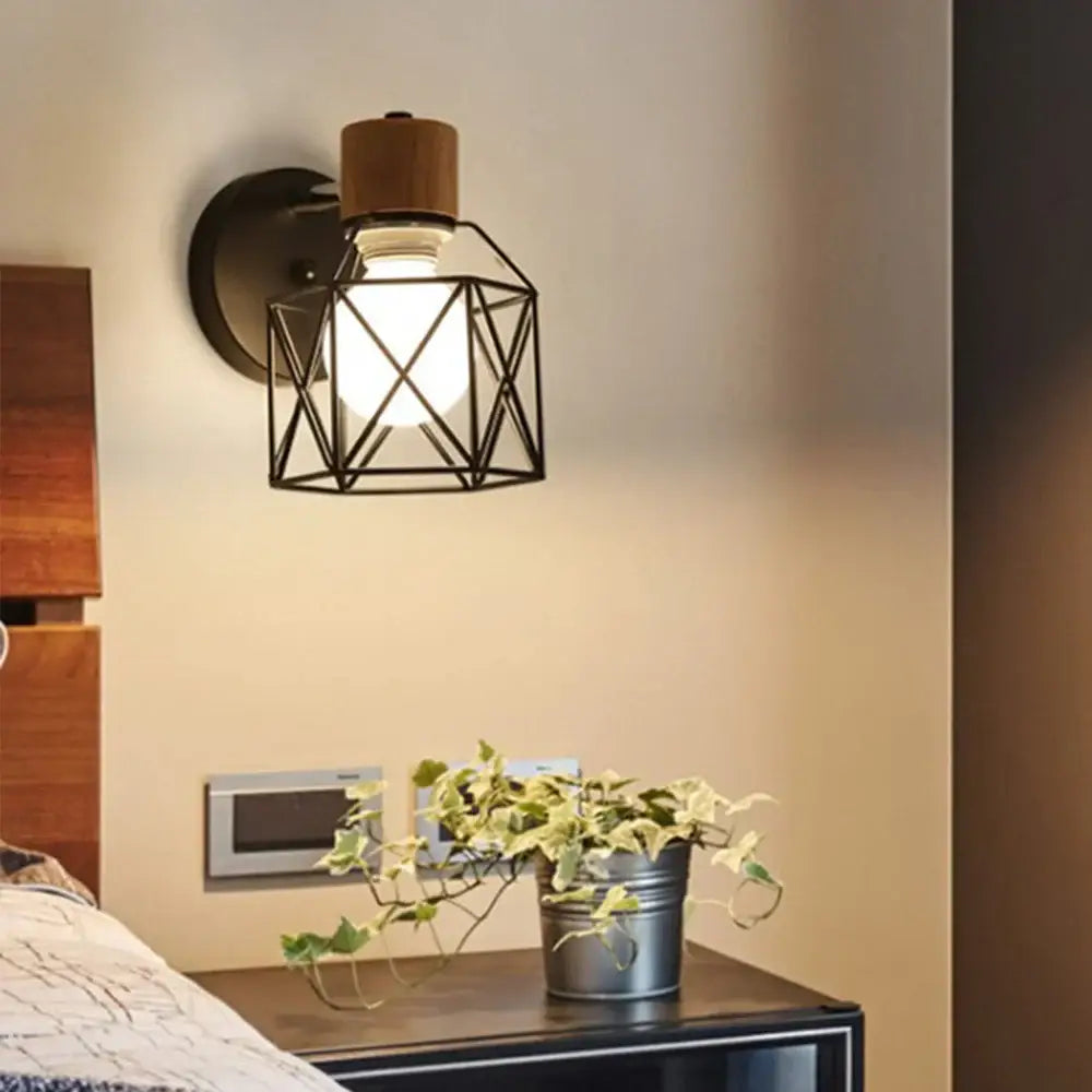 Geometric black iron cage wall light for bedroom decor