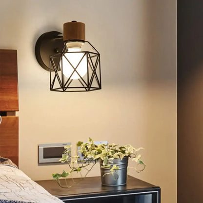 Geometric black iron cage wall light for bedroom decor
