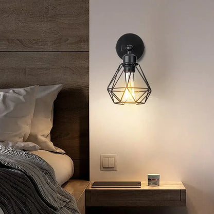 Geometric black iron cage wall light for bedroom decor