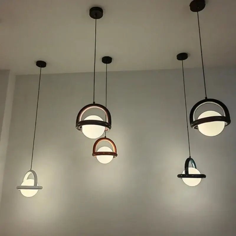 Minimalist arched wood and terracotta led pendant lights dining room