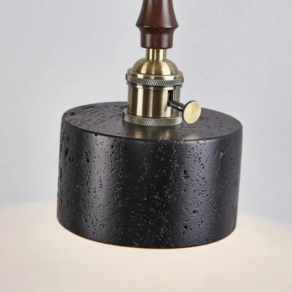 Black travertine cylindrical pendant light for dining room