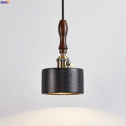 Black travertine cylindrical pendant light for dining room