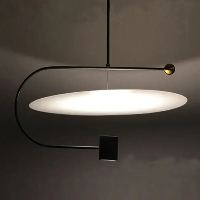 Modern minimalist gray and black pendant light fixture dining room