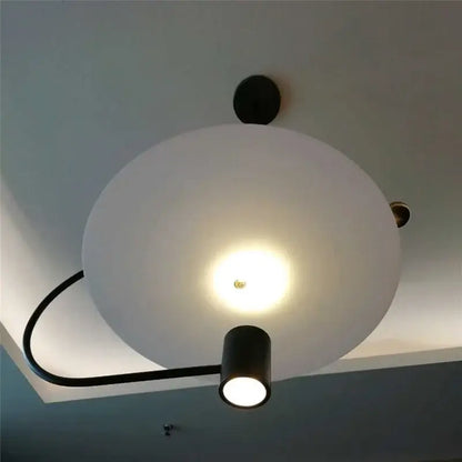 Modern minimalist gray and black pendant light dining room