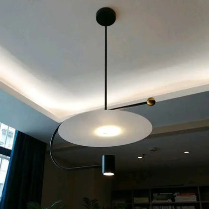 Modern minimalist gray and black pendant light dining room