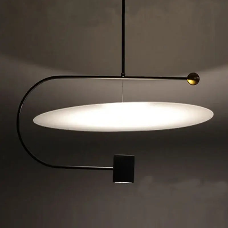 Modern minimalist gray and black pendant light dining room