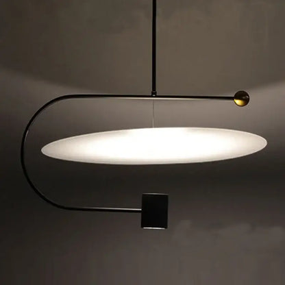 Modern minimalist gray and black pendant light dining room