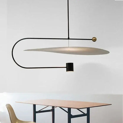 Modern minimalist gray and black pendant light dining room