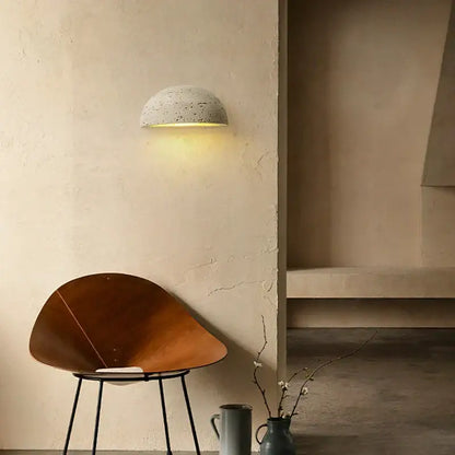 Textured travertine wall light – porch warm yellow sconce