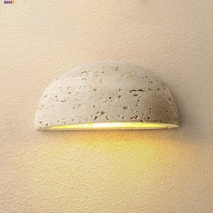 Textured travertine wall light – porch warm yellow sconce