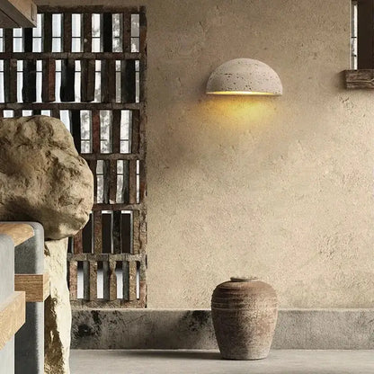 Textured travertine wall light – porch warm yellow sconce