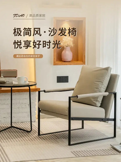 Modern brown leather lounge chair reception area black metal frame