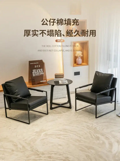 Brown leather single sofa chair with black metal frame for reception