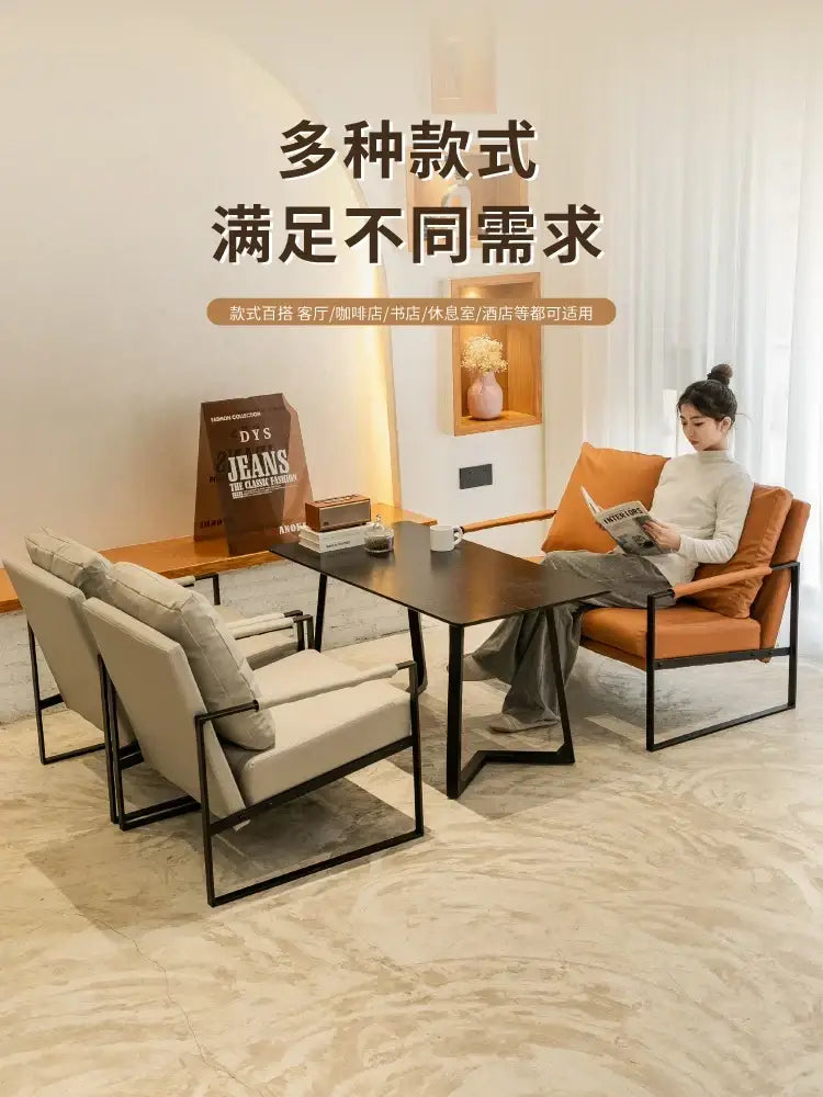 Brown leather single sofa chair with black metal frame for reception