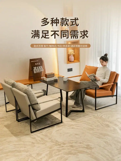 Brown leather single sofa chair with black metal frame for reception