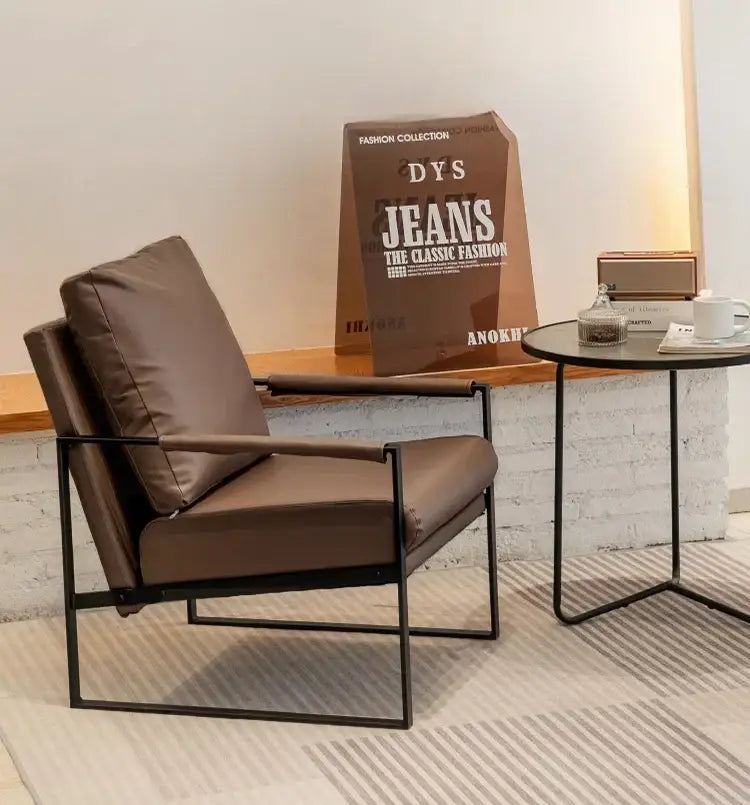 Brown leather single sofa chair with black metal frame for reception