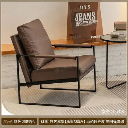 Brown leather single sofa chair with black metal frame for reception
