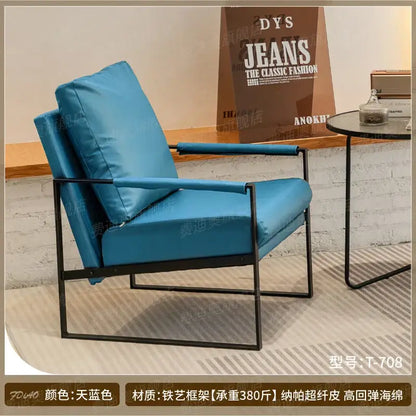 Brown leather single sofa chair with black metal frame for reception