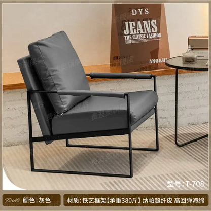 Brown leather single sofa chair with black metal frame for reception