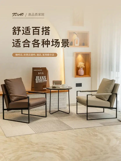 Brown leather single sofa chair with black metal frame for reception