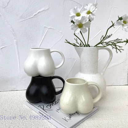 Playful white speckled butt shape ceramic coffee cup kitchen decor
