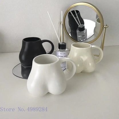 Playful white speckled butt shape ceramic coffee cup kitchen decor