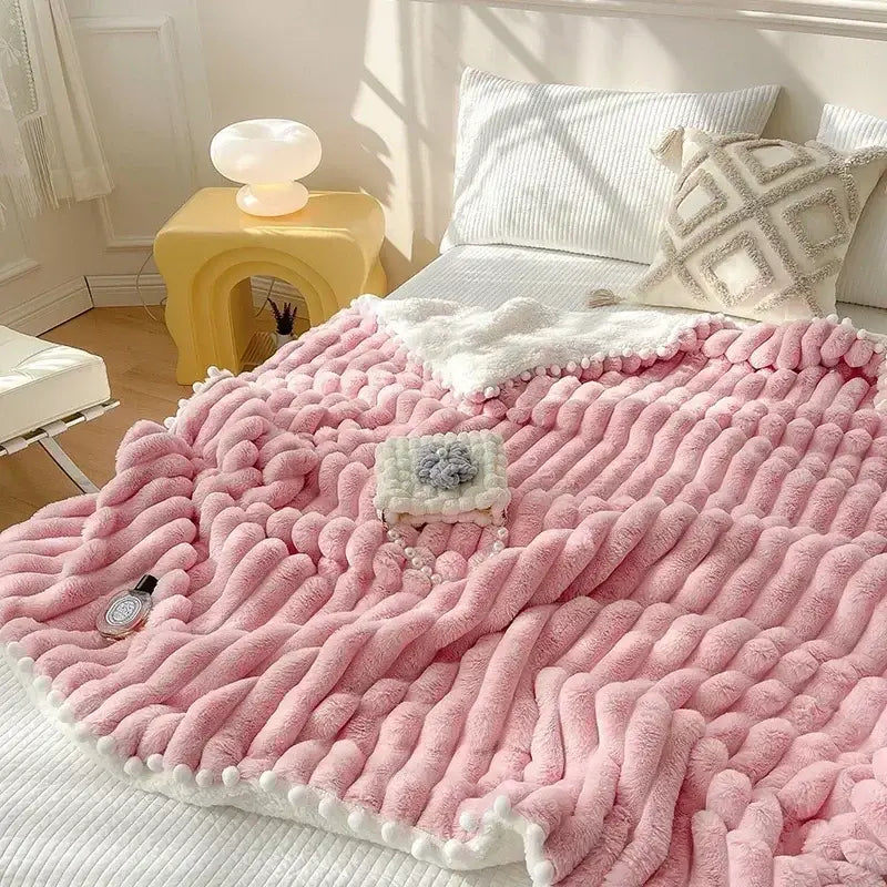 Pink faux rabbit fur chunky knit blanket with pom poms bedroom throw