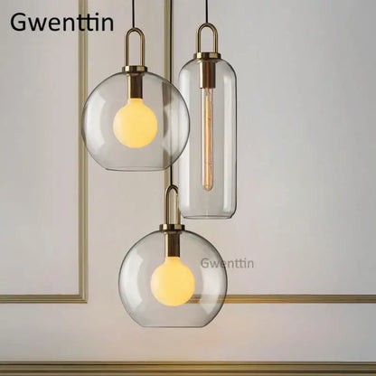 Luxe glass ball pendant lights brass and frosted glass dining room