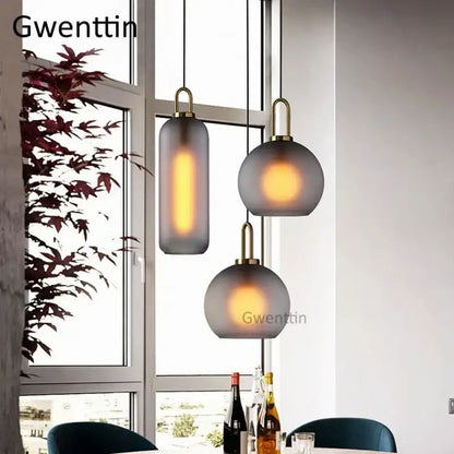 Luxe glass ball pendant lights brass and frosted glass dining room