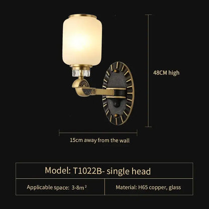 Luxe jade brass chandelier with frosted glass for living room