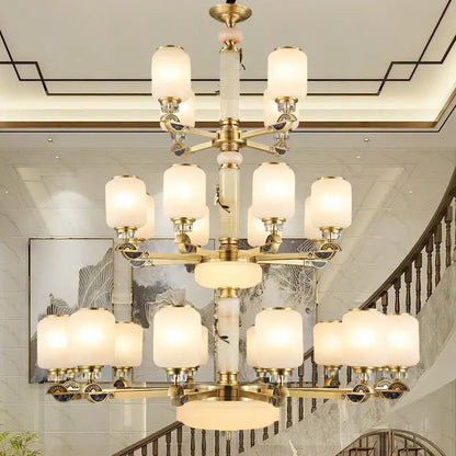 Luxe jade brass chandelier with frosted glass for living room