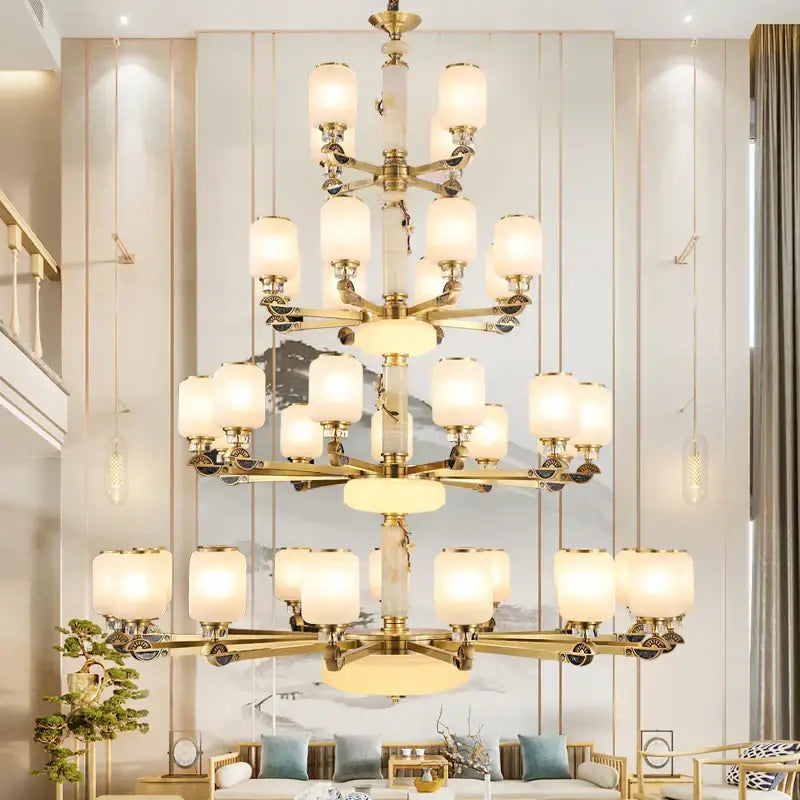 Luxe jade brass chandelier with frosted glass for living room