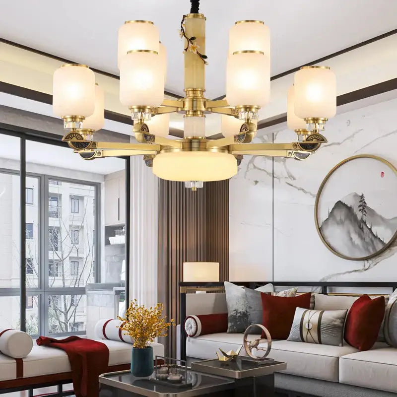 Luxe jade brass chandelier with frosted glass for living room