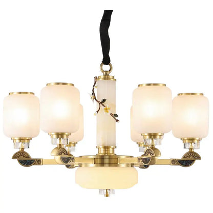 Luxe jade brass chandelier with frosted glass for living room