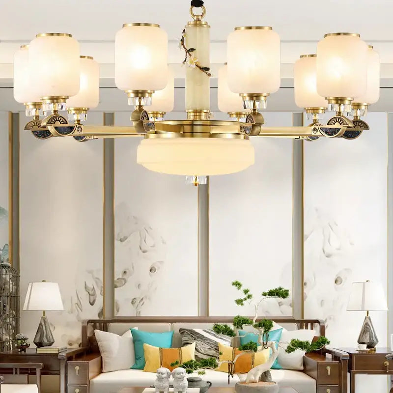 Luxe jade brass chandelier with frosted glass for living room