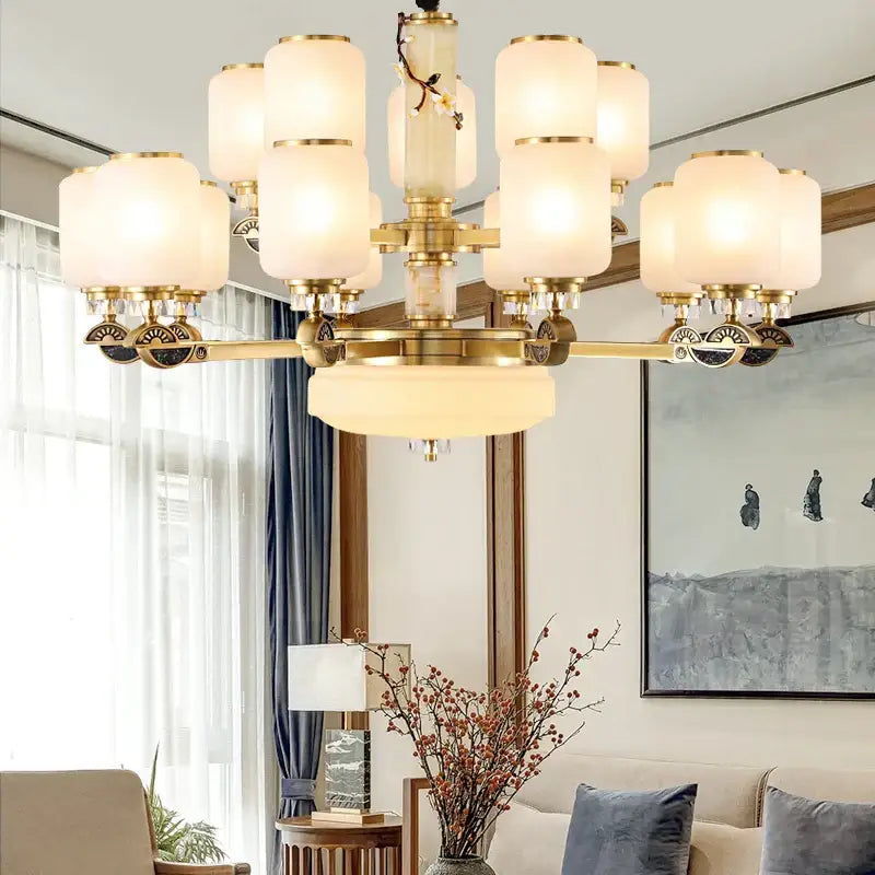 Luxe jade brass chandelier with frosted glass for living room