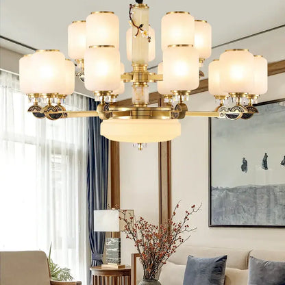 Luxe jade brass chandelier with frosted glass for living room