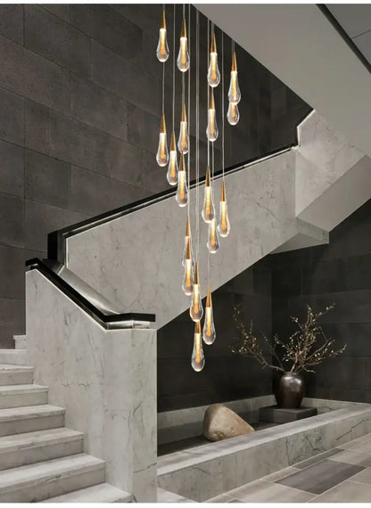 Modern gold crystal light chandelier staircase cascading glass teardrop