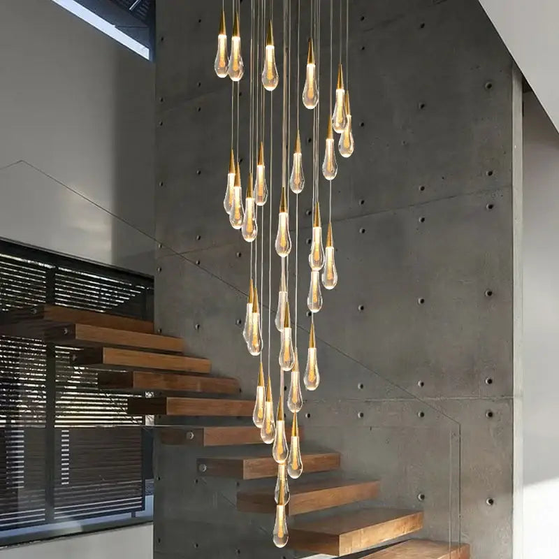 Modern gold crystal light chandelier staircase cascading glass teardrop