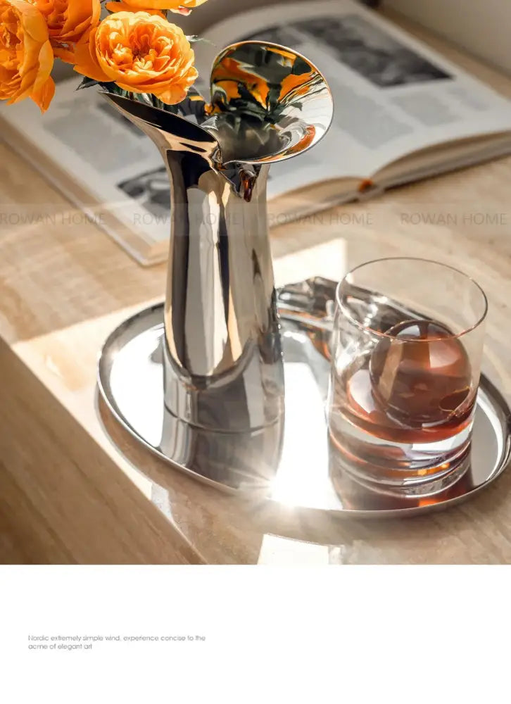 Modern sculptural silver stainless steel vase living room decor