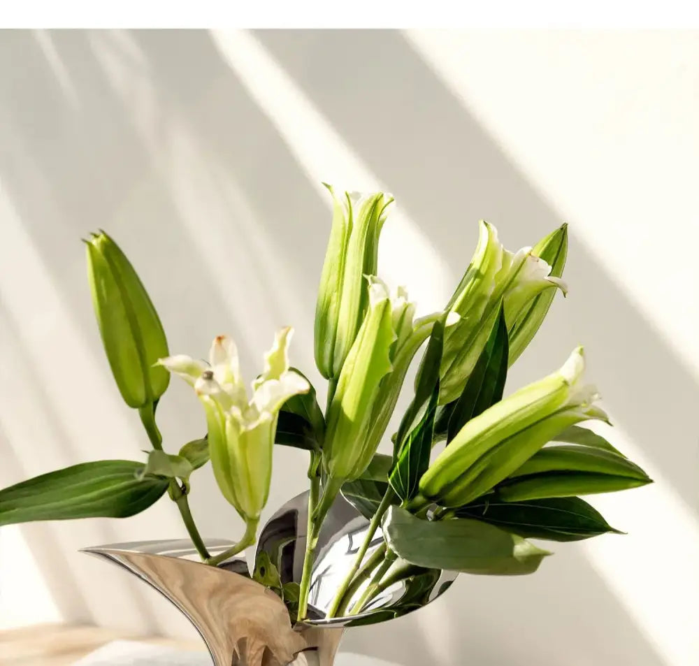 Modern sculptural silver stainless steel vase living room decor