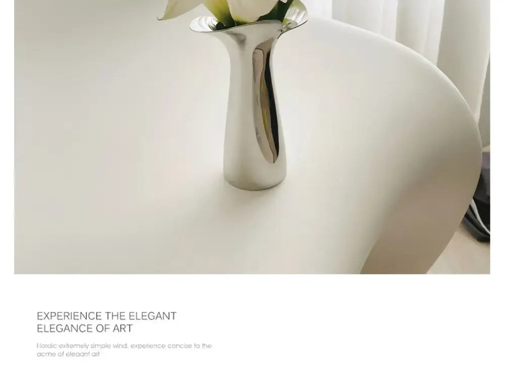 Modern sculptural silver stainless steel vase living room decor