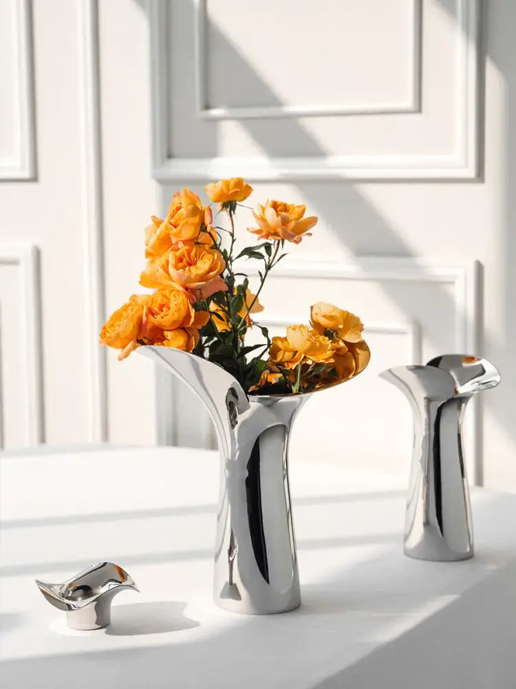 Modern sculptural silver stainless steel vase living room decor