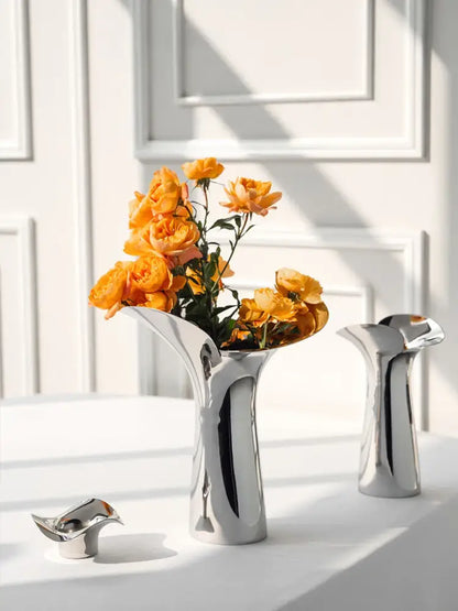 Modern sculptural silver stainless steel vase living room decor