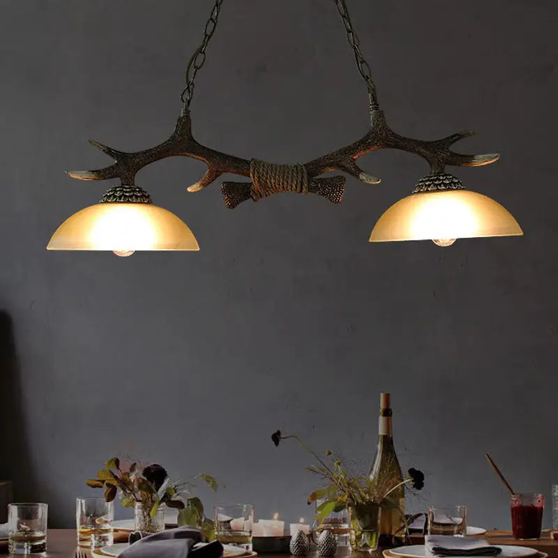 Rural antler and milk glass bowl pendant light dining room