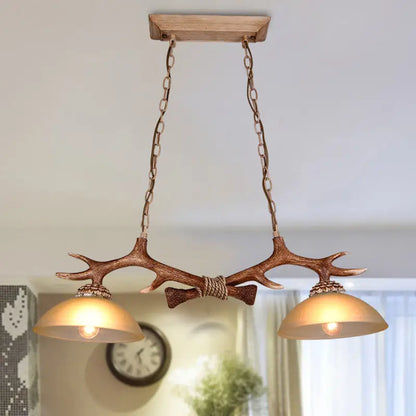 Rural antler and milk glass bowl pendant light dining room