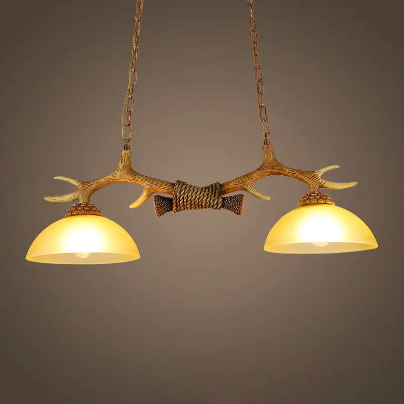 Rural antler and milk glass bowl pendant light dining room