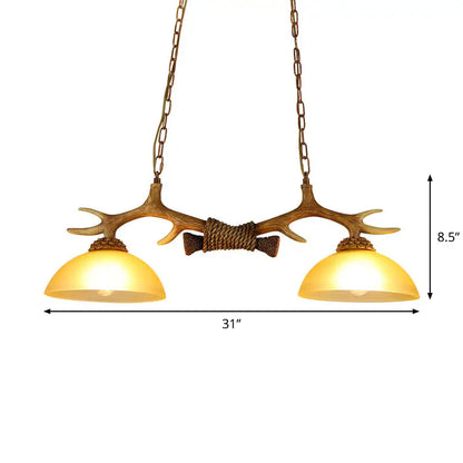 Rural antler and milk glass bowl pendant light dining room