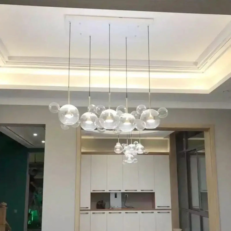 Modern brass bubble cluster pendant light – dining room clear glass